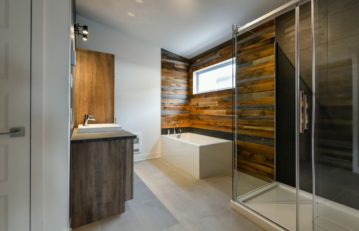Modern bathroom with barn wood general view